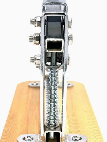 Pelamatic nutcracker shows adjustable opening for different nut sizes.