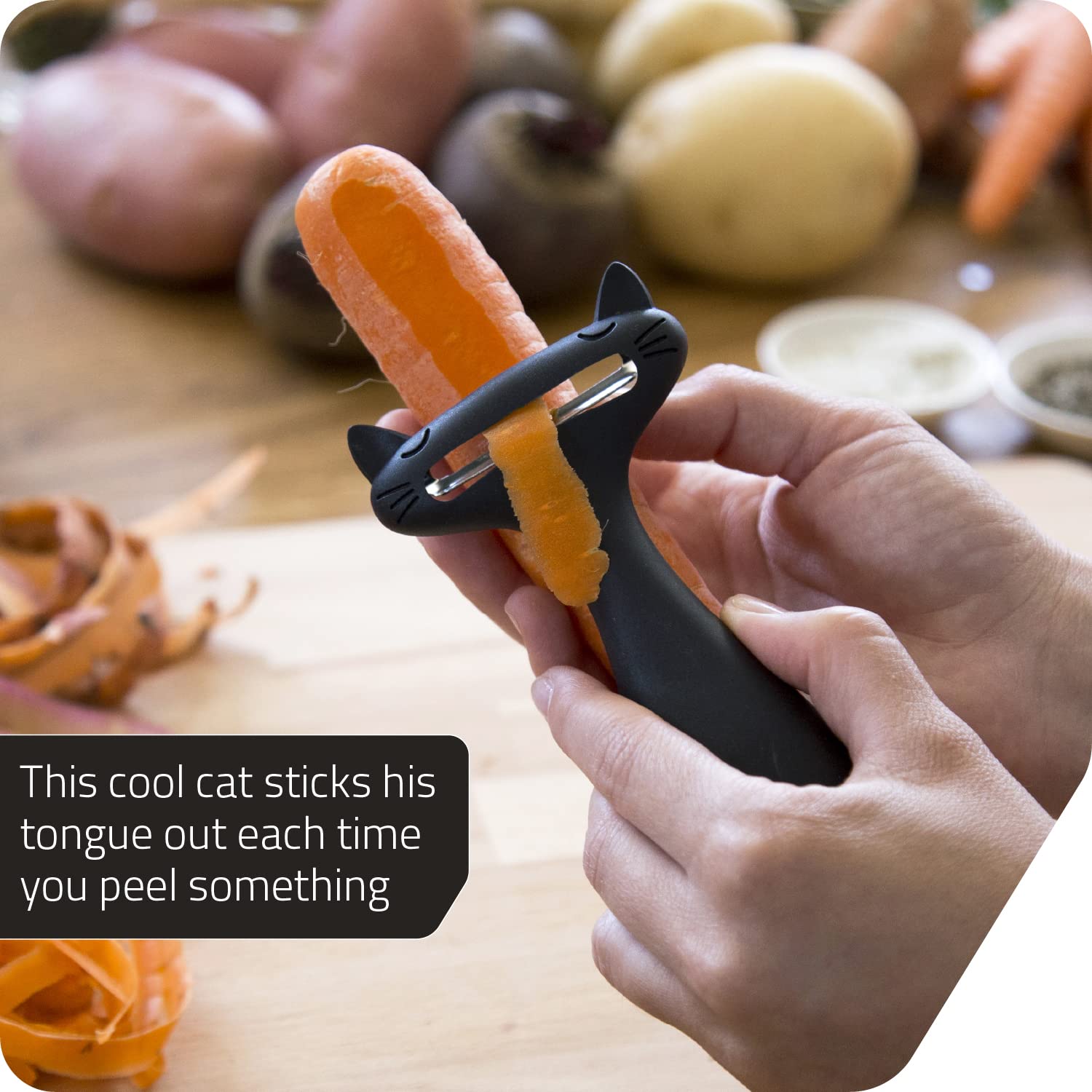 Peleg Design CatPeeler cat-shaped peeler on counter adds playful kitchen decor.