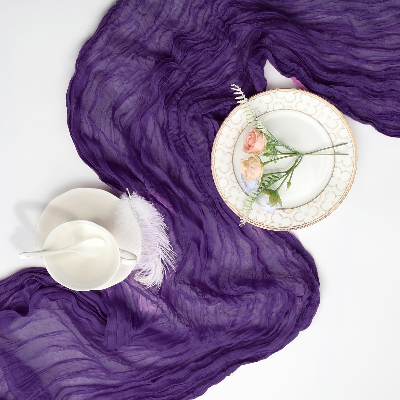 pepmily wedding decor idea: paired purple runners with airy lanterns