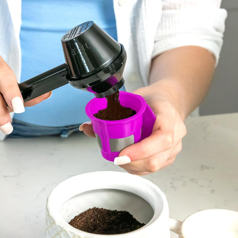 Perfect Pod Cafe Save scoop in use measuring grounds for a brew