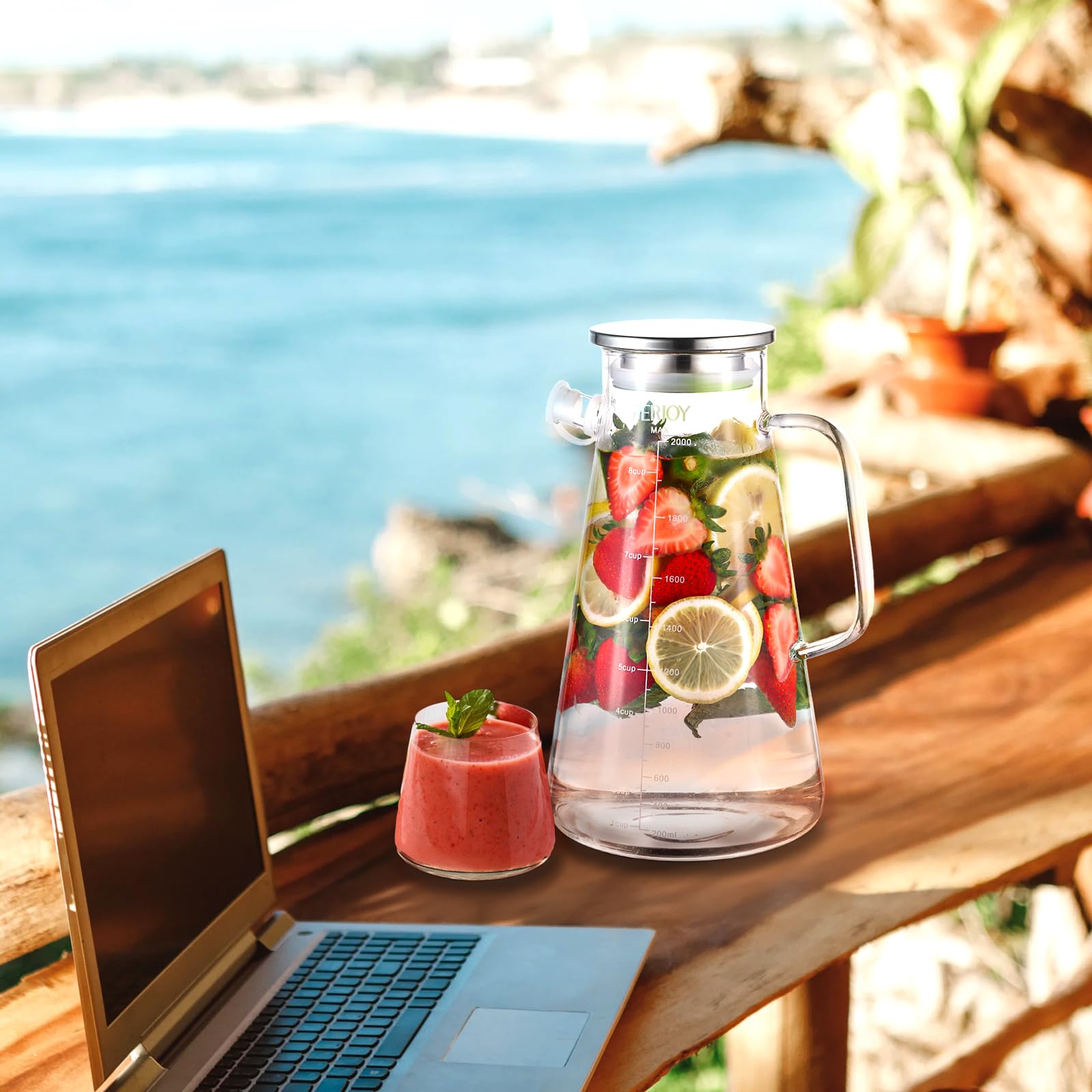 Perjoy pitcher lid and stainless steel cap secures spill-free pouring.