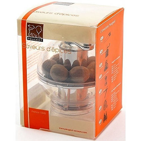 Peugeot 19501 Tidore Nutmeg Mill clear acrylic body blends with kitchen decor and function.
