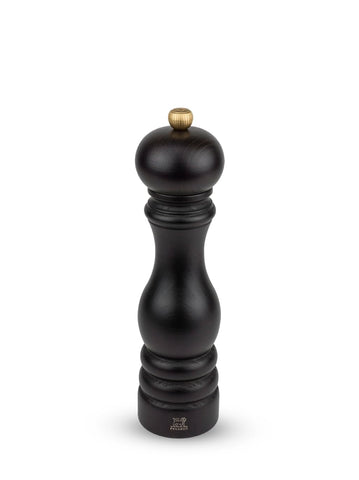 Peugeot Paris manual pepper mill in chocolate finish shows precise grind for table flavor.