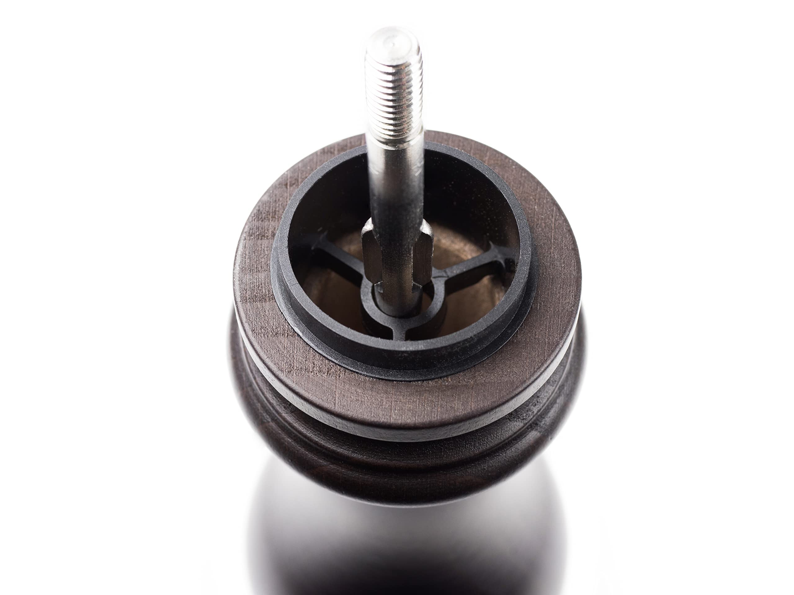 Peugeot Paris u'Select pepper mill in use on a dining table for seasoning dishes.