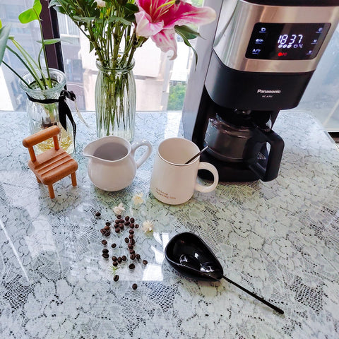 PFCTRJR coffee station organizer fits beside the coffee maker.