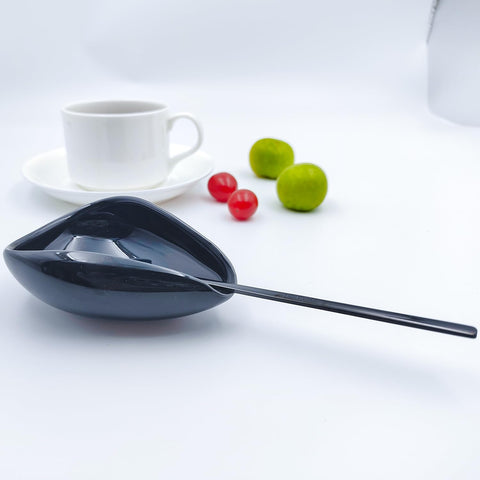 PFCTRJR spoon rest with spoons on the counter demonstrates clutter-free workspace.