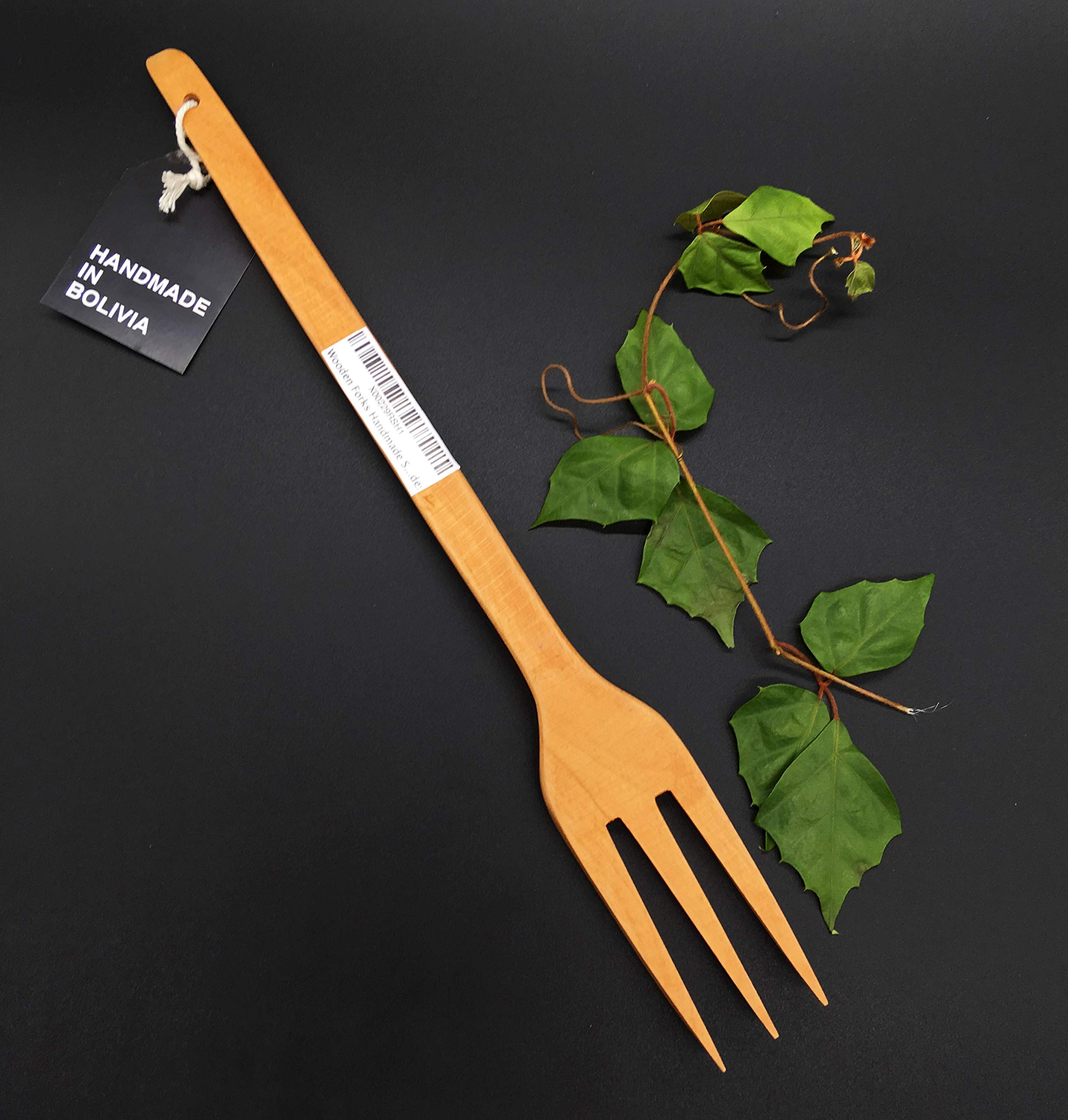 Phai Designs wooden fork three tines displayed as decorative kitchen piece