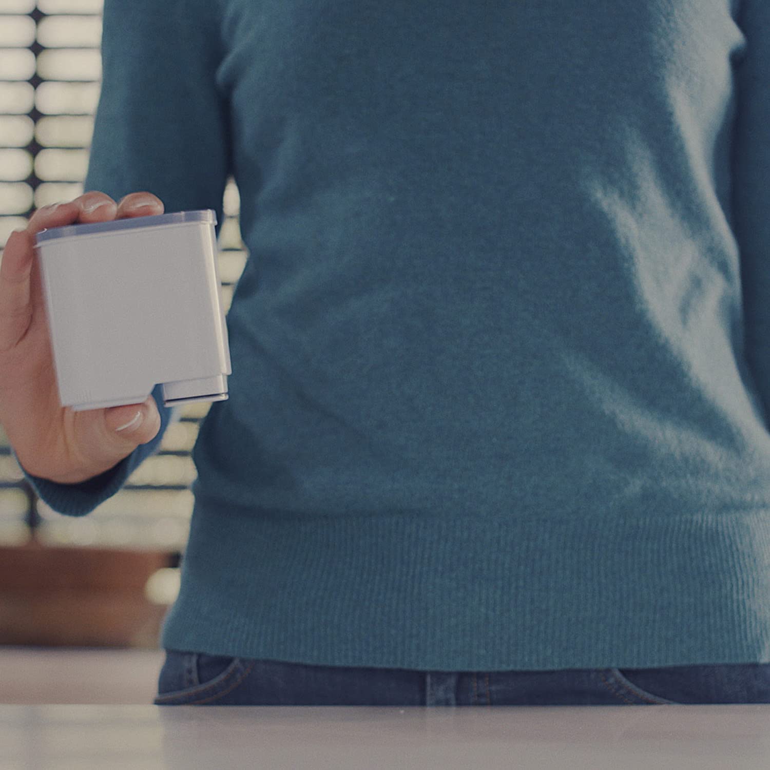 Philips AquaClean filter installation being performed for convenient setup