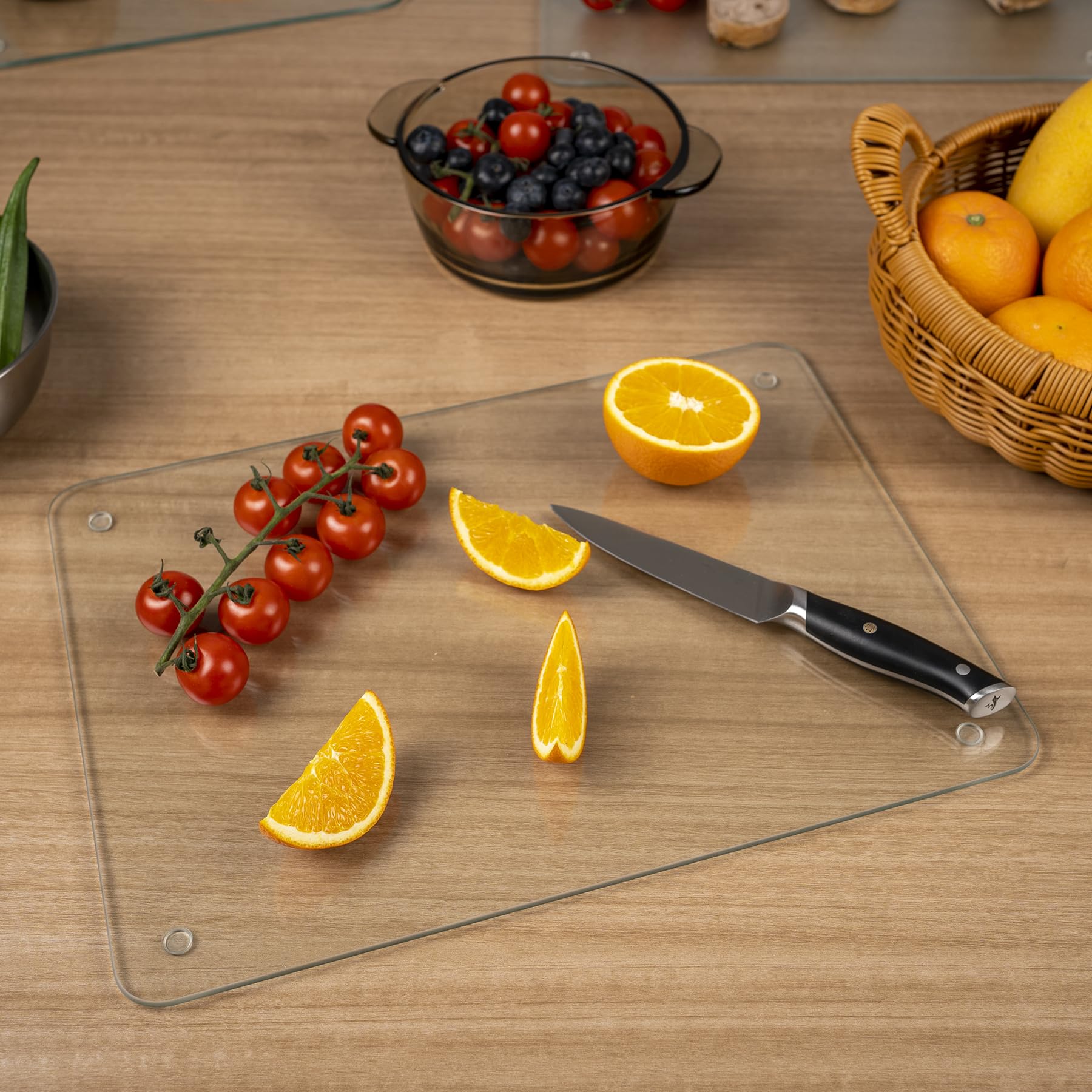Phore glass cutting board acts as a heat safe countertop protector during cooking
