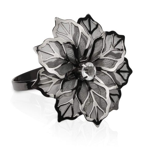 Picowe napkin rings with hollow flower add elegant texture to gun metal tables.