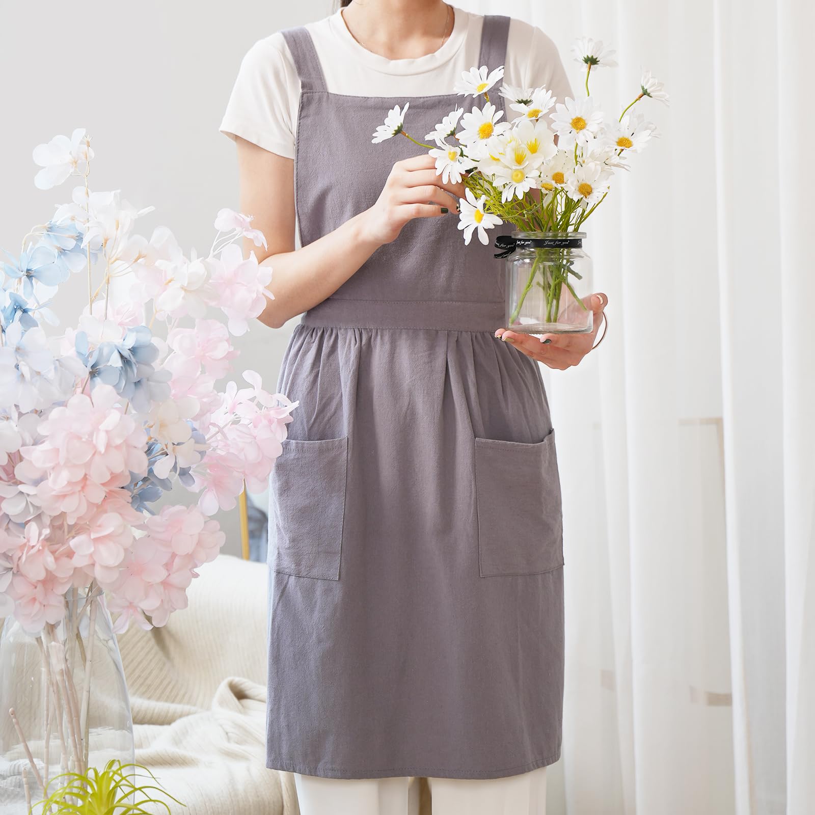 Pinknoke apron gray pocket dress closeup shows dual pockets for handy prep tools.