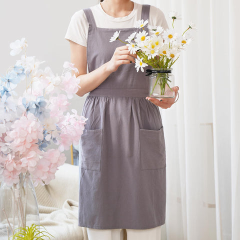 Pinknoke apron gray pocket dress closeup shows dual pockets for handy prep tools.