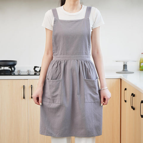 Pinknoke apron gray waist strap detail highlights adjustable fit.