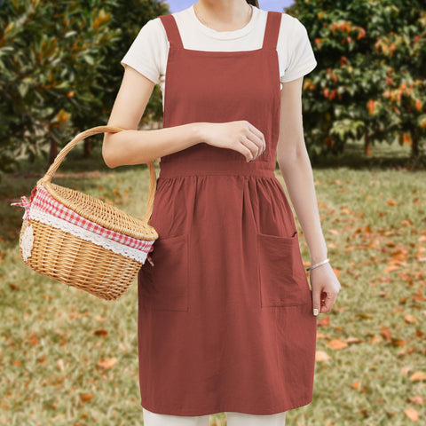 Pinknoke apron pockets close-up shows practical storage for tools and utensils.