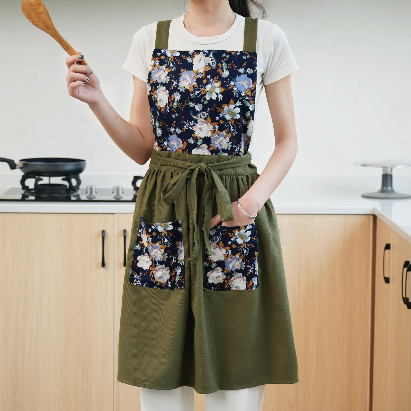 Classic Pinknoke fabric texture in olive-green apron.