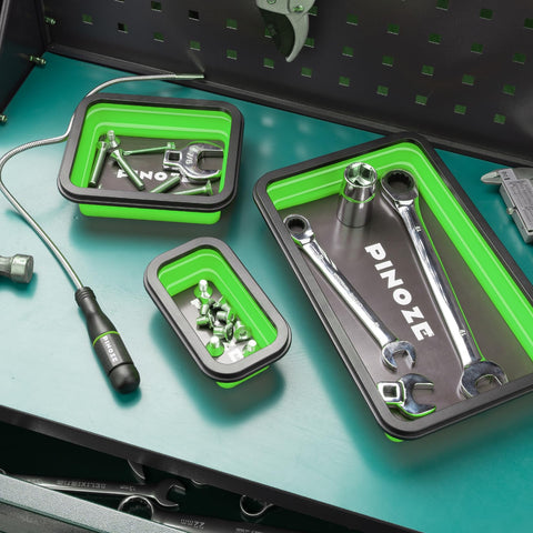 PINOZE magnetic pickup tool in use to grab bolts from a corner.