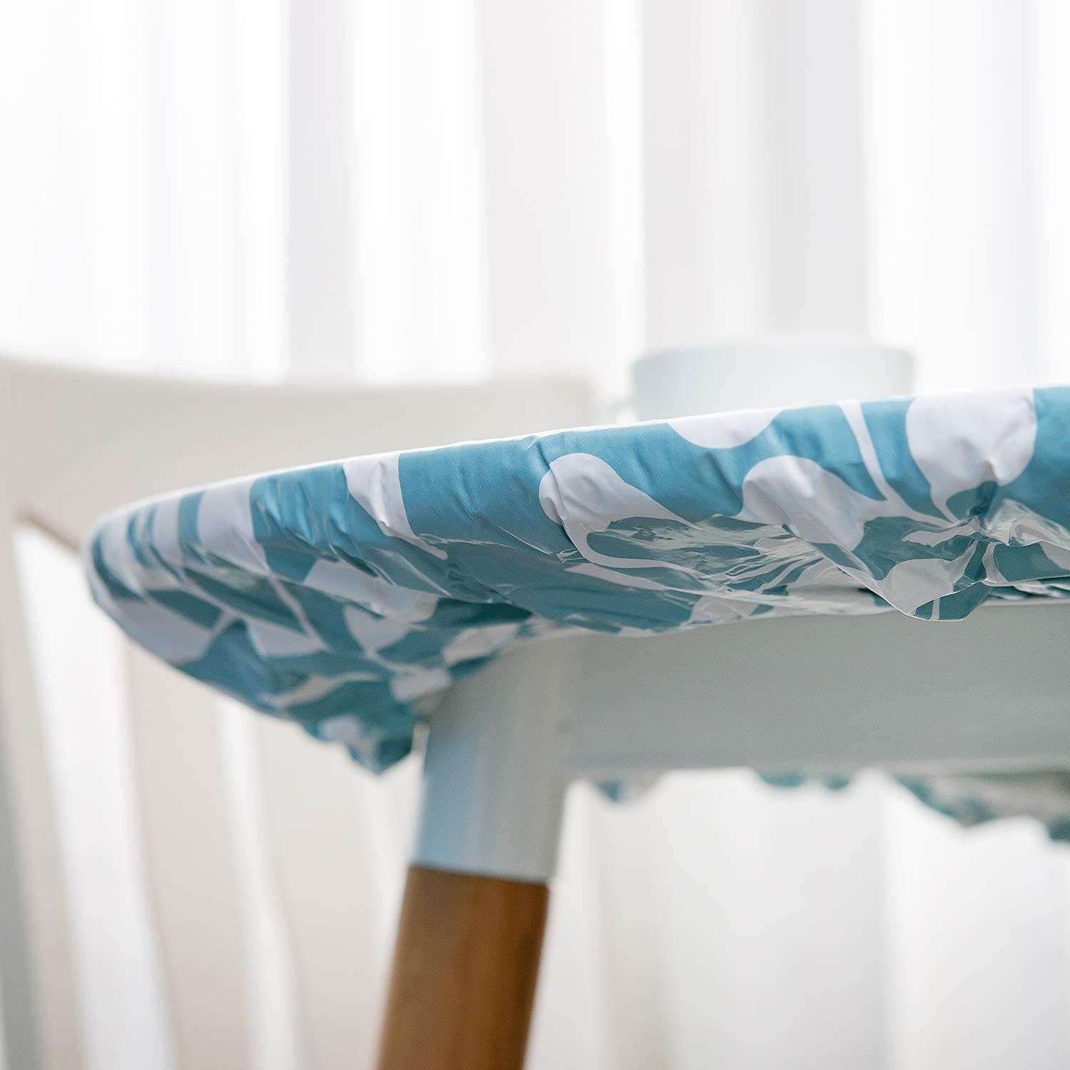 Pioggia 45 to 56 inch round table cover designed for versatile setups.
