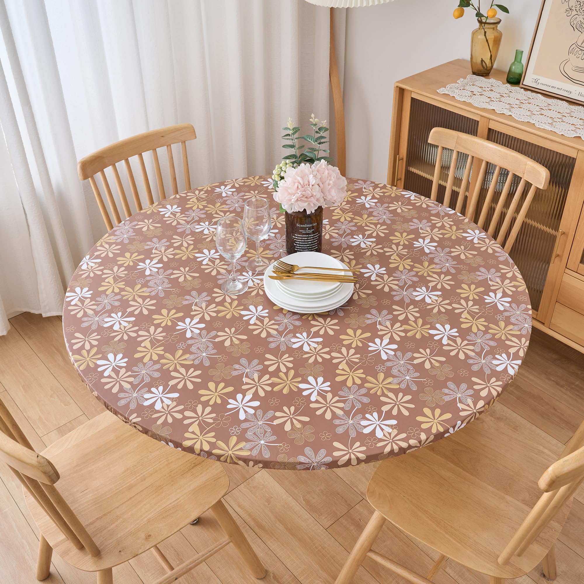 Pioggia round tablecloth shows flannel backing protecting the table surface