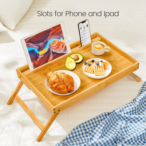Pipishell bamboo serving tray with lip and slot keeps items secure on the move.
