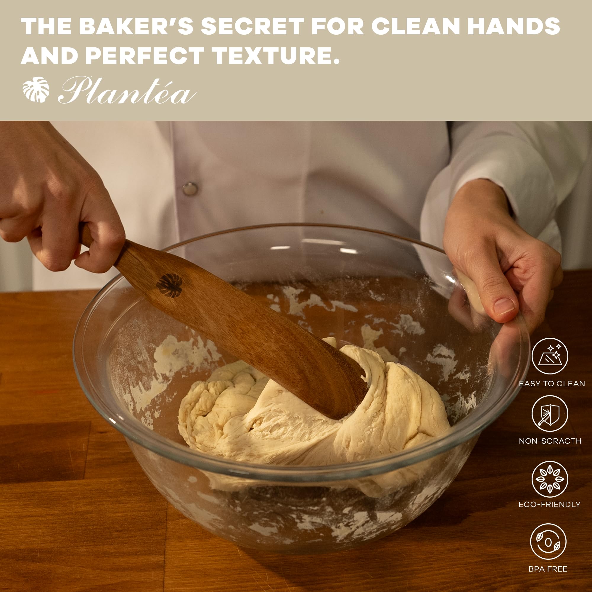 Closeup of handcrafted PLANTÉA wooden spurtle showing smooth finish for easy stirring.