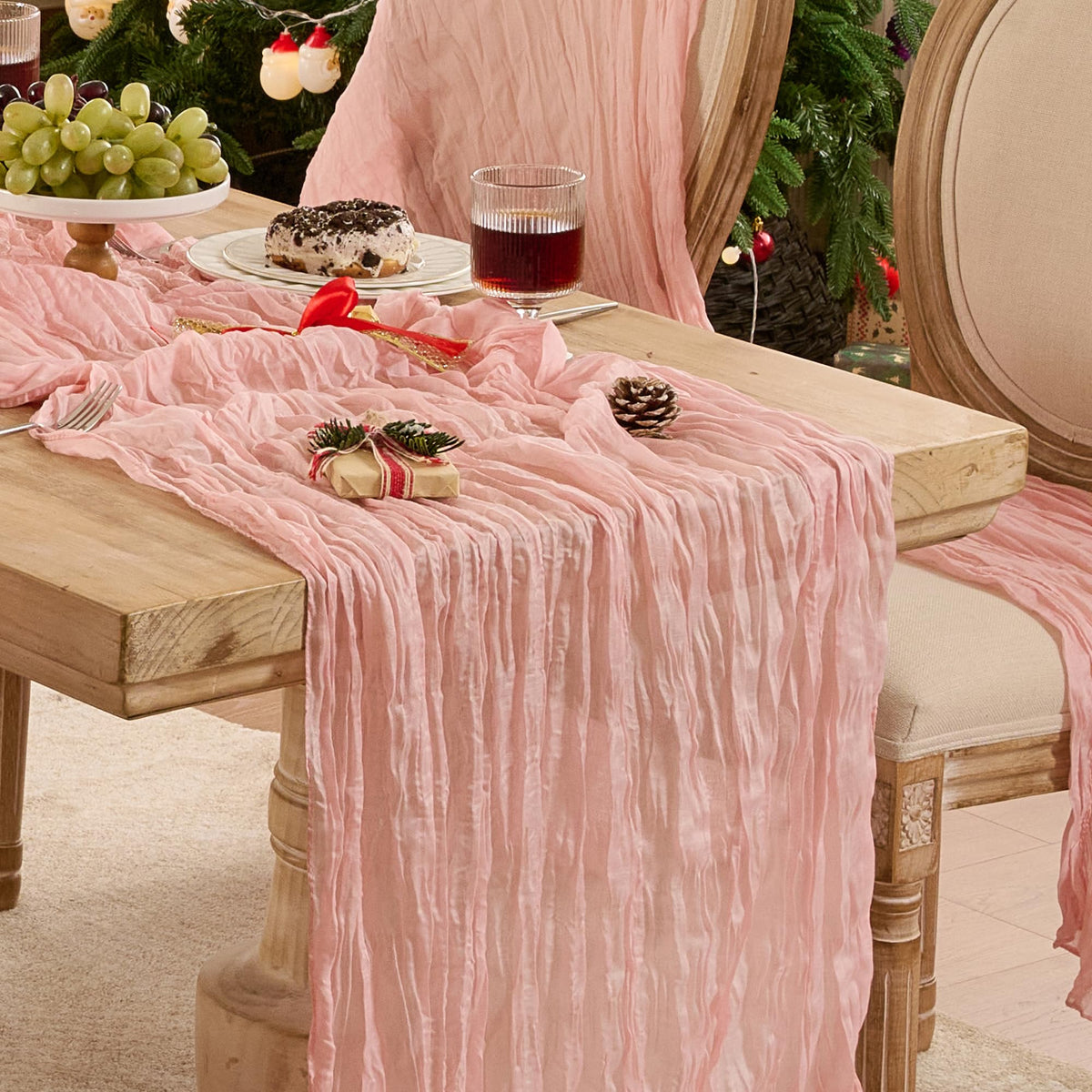 Playieer dusty-pink cheesecloth table runner for a soft, romantic wedding tablescape.