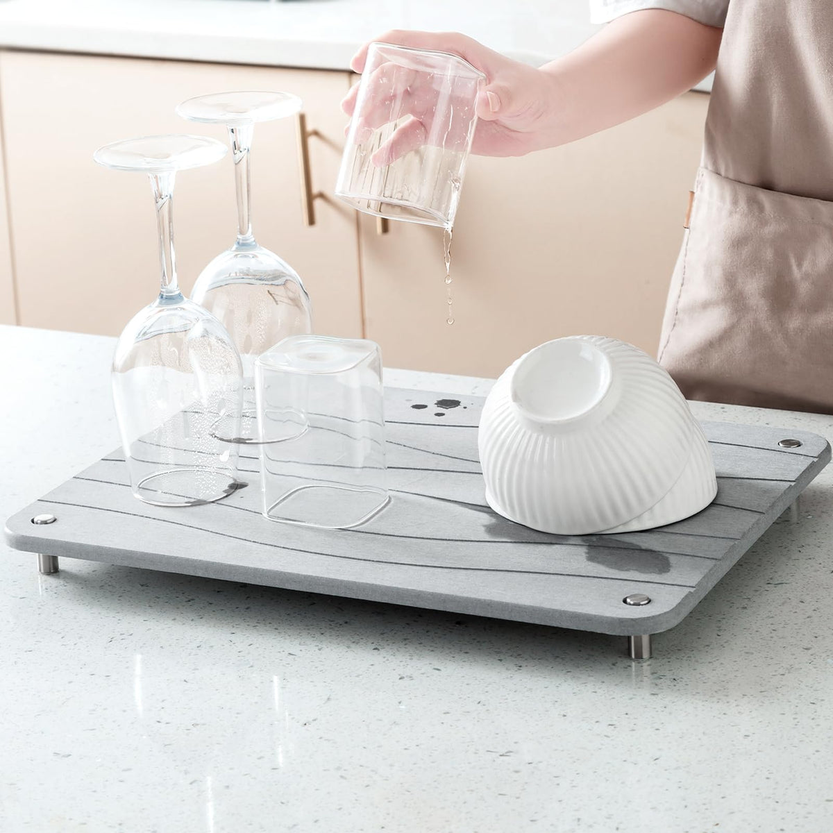 Plentio Stone Drying Mat on counter showing porous absorption for fast dish drying.