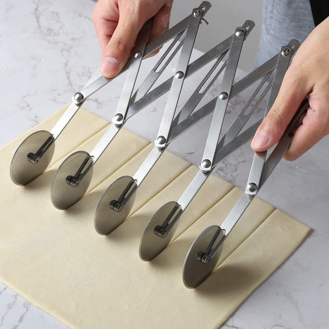 Pobowlgarls stainless steel pizza cutter in drawer storage demonstrates easy maintenance and rust resistance.