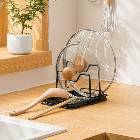 Poeland lid holder with drip tray catches moisture and protects countertops.