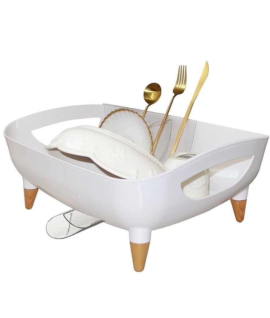 PookSter dish drying rack on a clean countertop with a modern sink drainer.