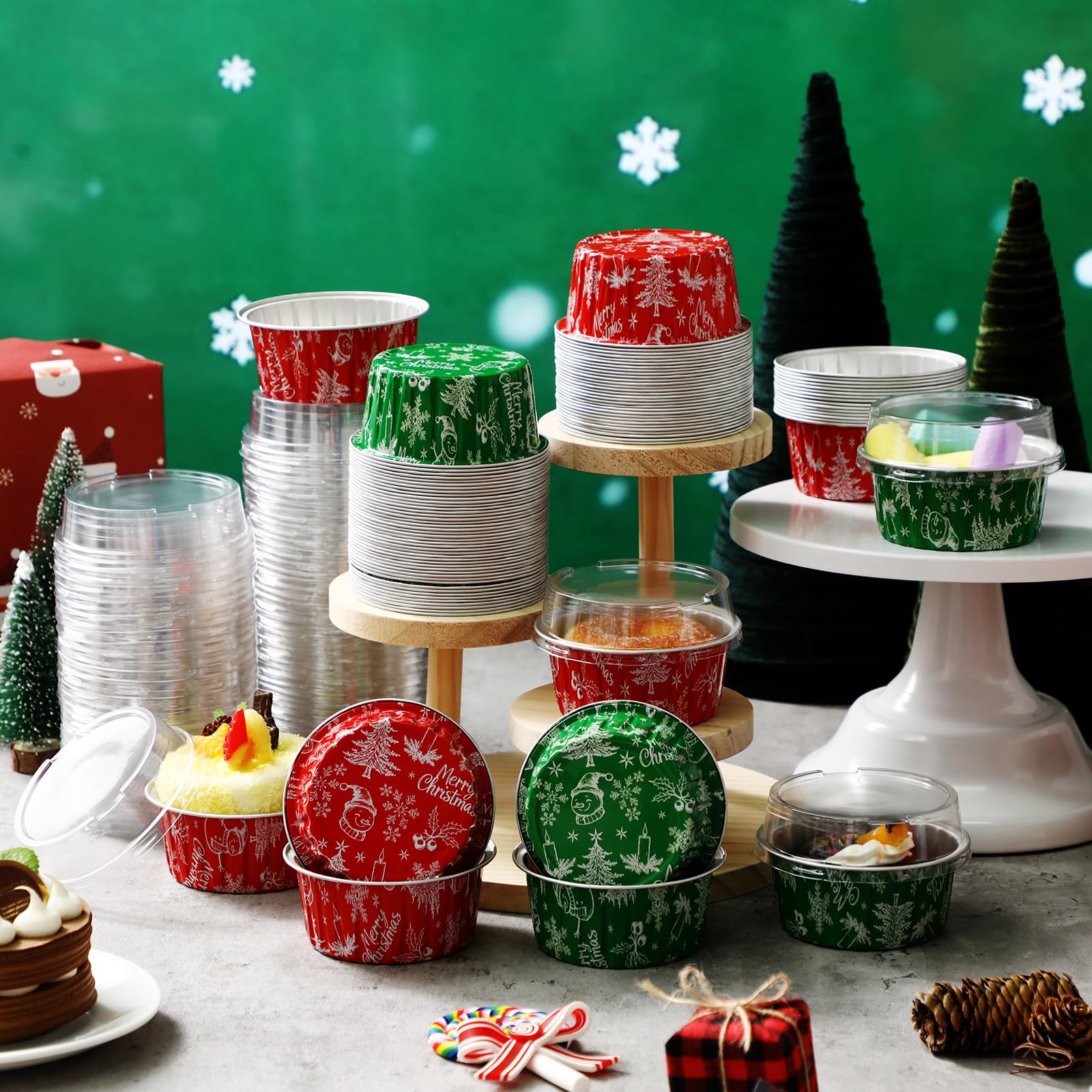 Potchen green Christmas foil cups with lid and snowman design for holiday treats.