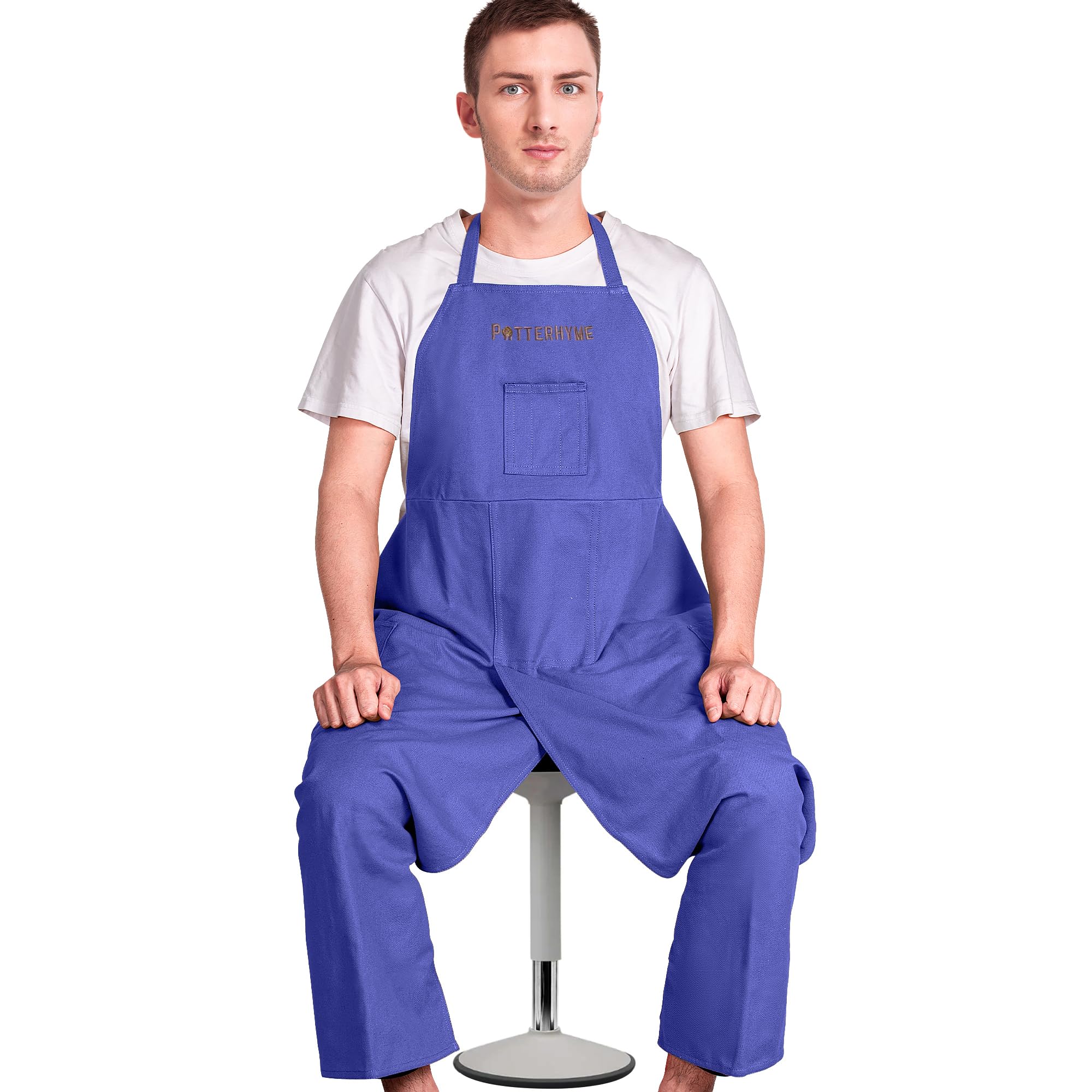 Potterhyme canvas apron with tool pockets keeps brushes and tools within reach.
