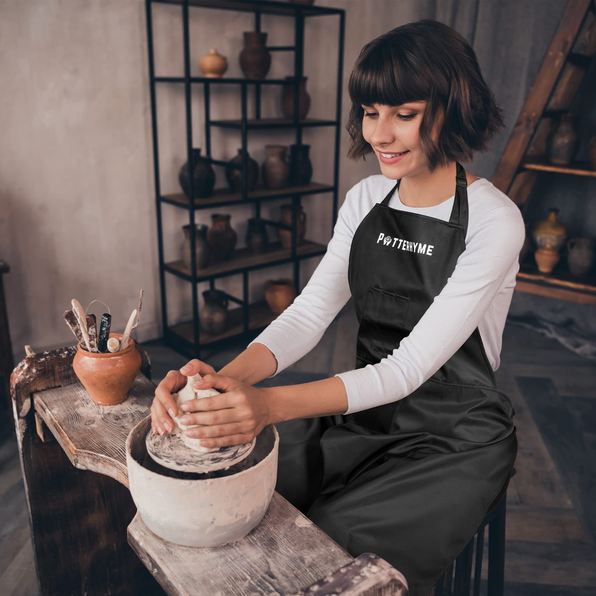 Potterhyme woodturning and painting apron protects clothing during lively studio work.
