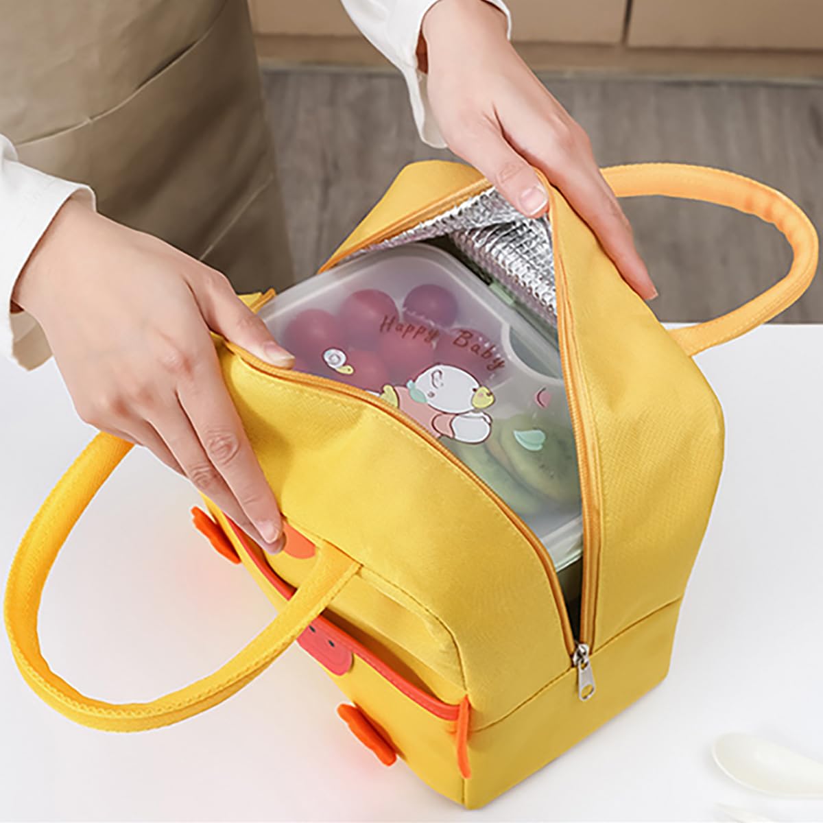 POYIPI duck lunch bag front zip pocket stores utensils and keys.