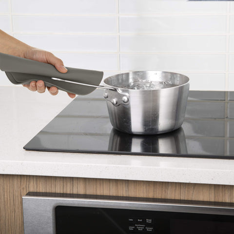 PrepSolutions jar opener capability on gray mat eases opening tight jars.