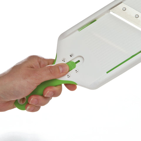PrepSolutions Adjust-A-Slice Mandoline Green hand guard ensures safe slicing during prep.