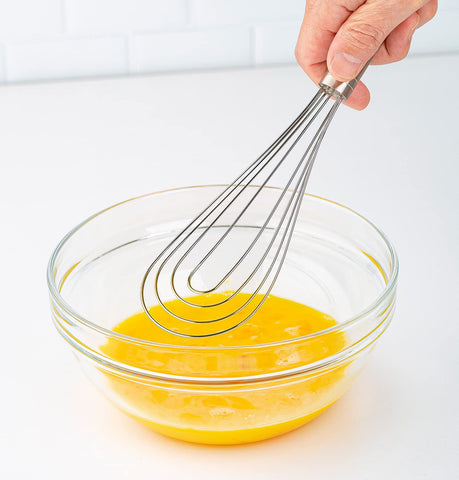 PrepWorks ergonomic handle whisk for comfortable stirring during cooking.