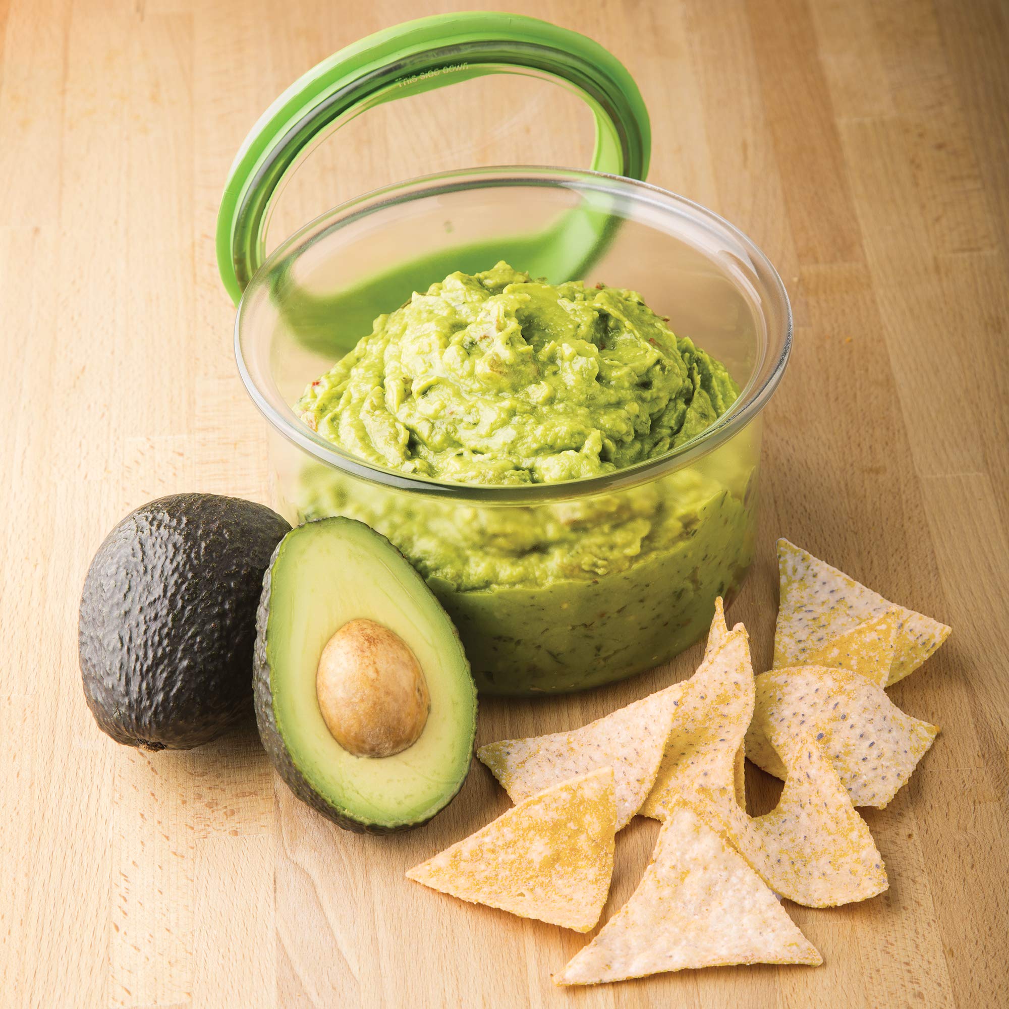 Serving guacamole in PREPWORKS ProKeeper dish for effortless sharing.
