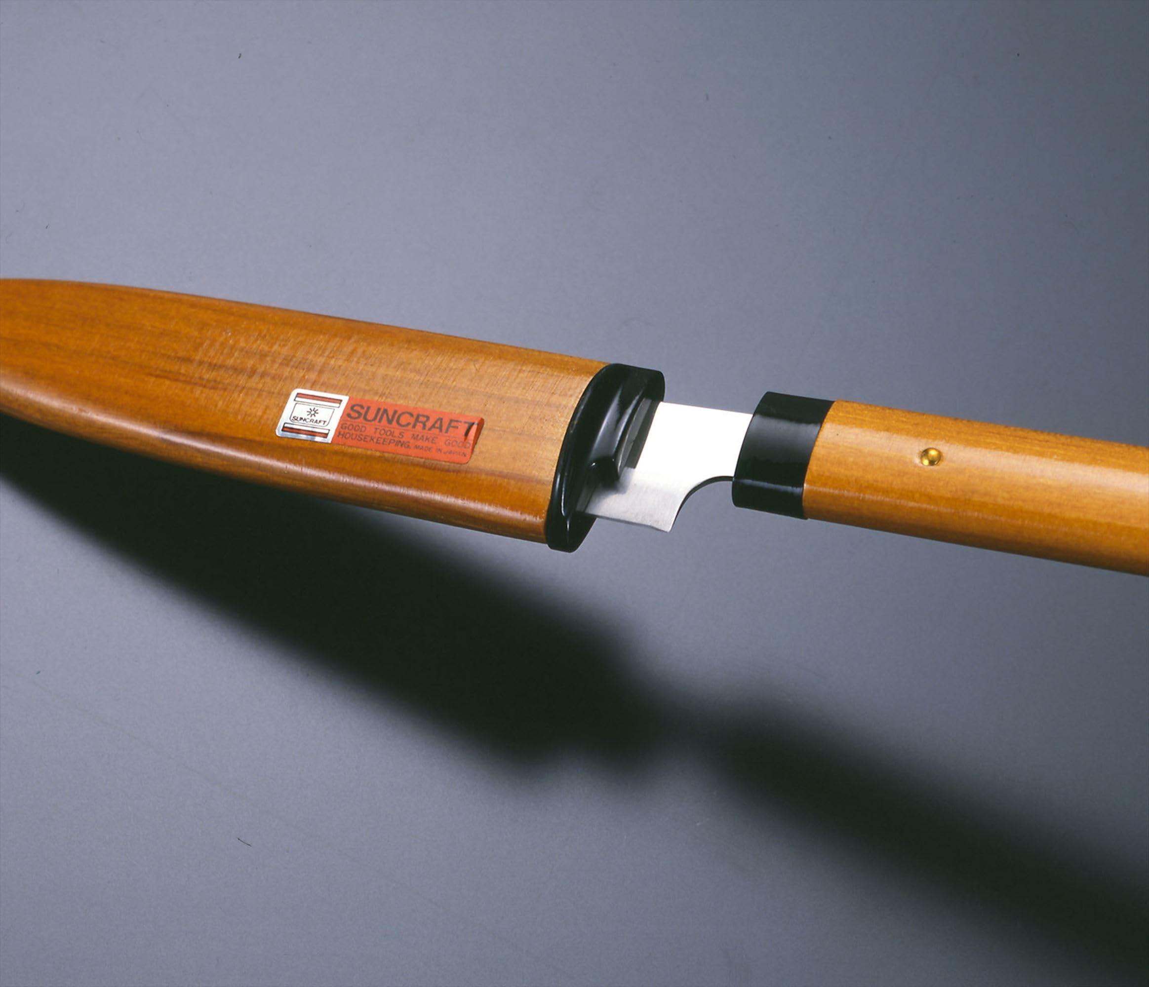 Product of Gifu Japan Seki Japan knife with Santoku/Gyuto-inspired shape for versatility.