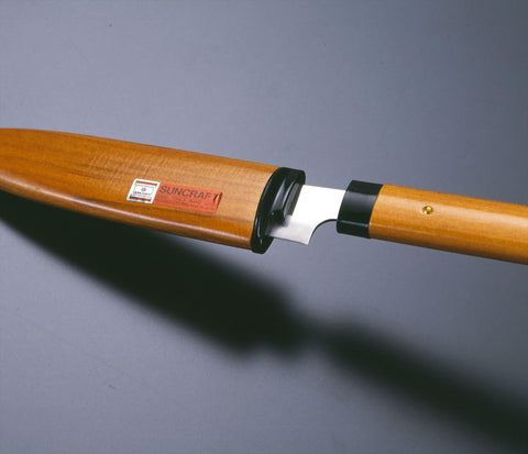 Product of Gifu Japan Seki Japan knife with Santoku/Gyuto-inspired shape for versatility.