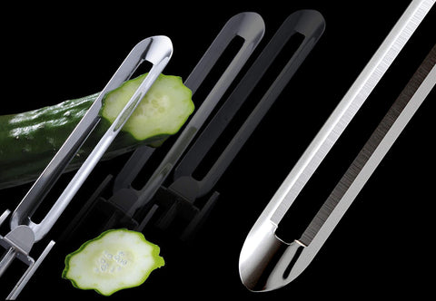 Dishwasher-safe stainless steel peeler after use in sink