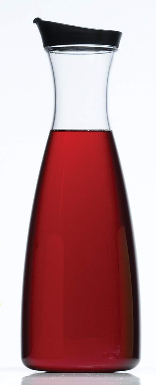 Prodyne acrylic juice carafe in refrigerator door, slim profile saves space.