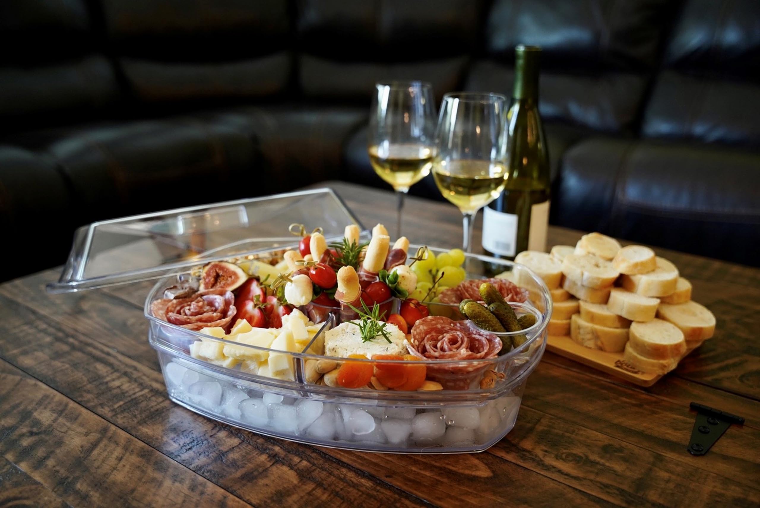 Prodyne Ice Party Platter clear lid blocks bugs during outdoor entertaining.