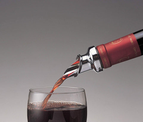 Prodyne pourer stopper with airtight rubberized base preserves freshness.