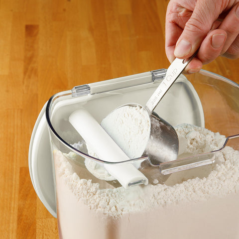 Progressive ProKeeper sugar canister with flip pour spout in use