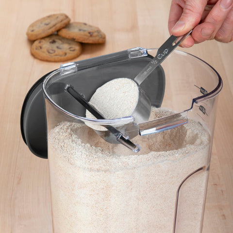 Progressive ProKeeper+ ½-cup scoop stored under lid for quick scooping.