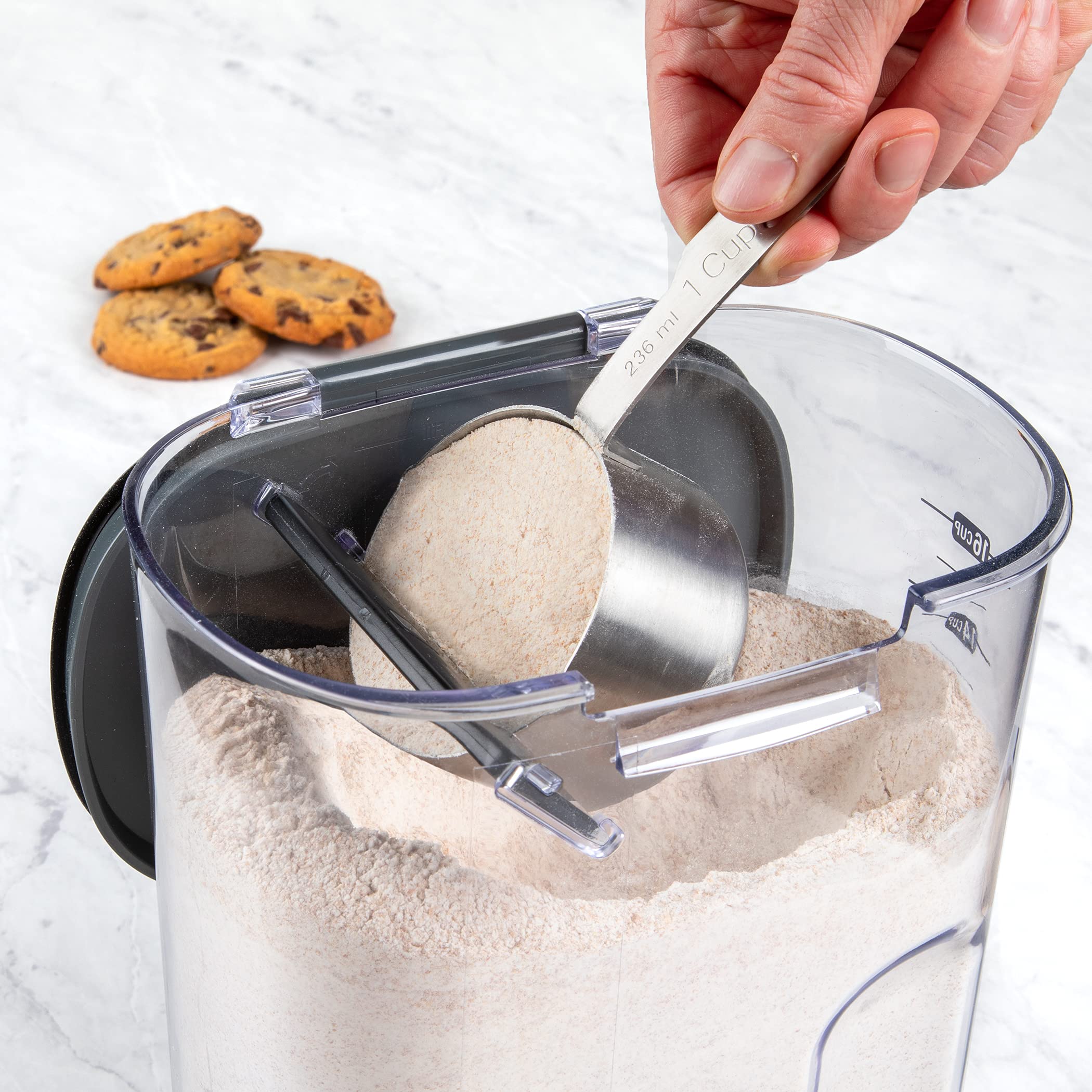 Progressive ProKeeper+ canister on pantry shelf keeps ingredients organized.