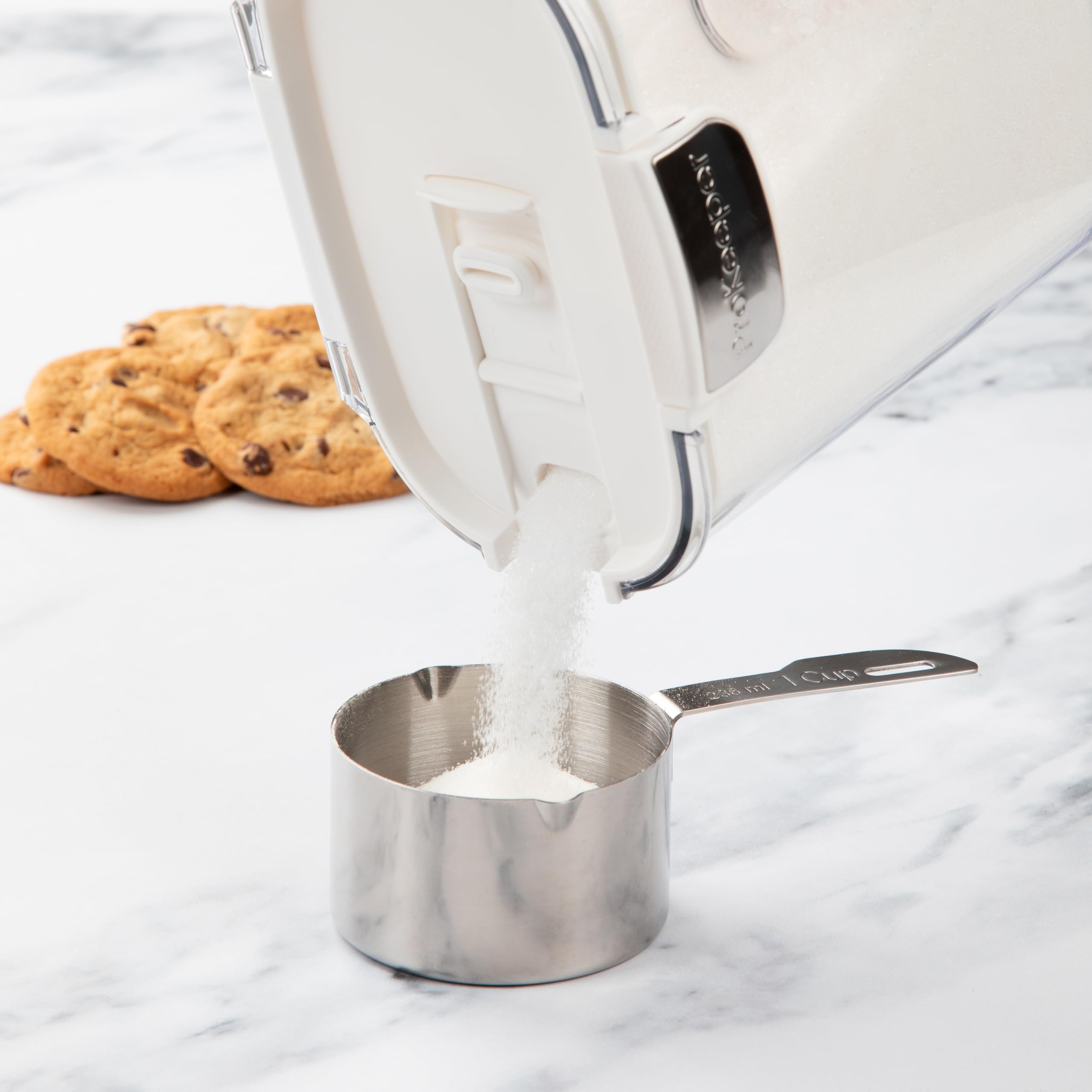 ProKeeper Dusting Spoon stores under lid for quick sprinkling.
