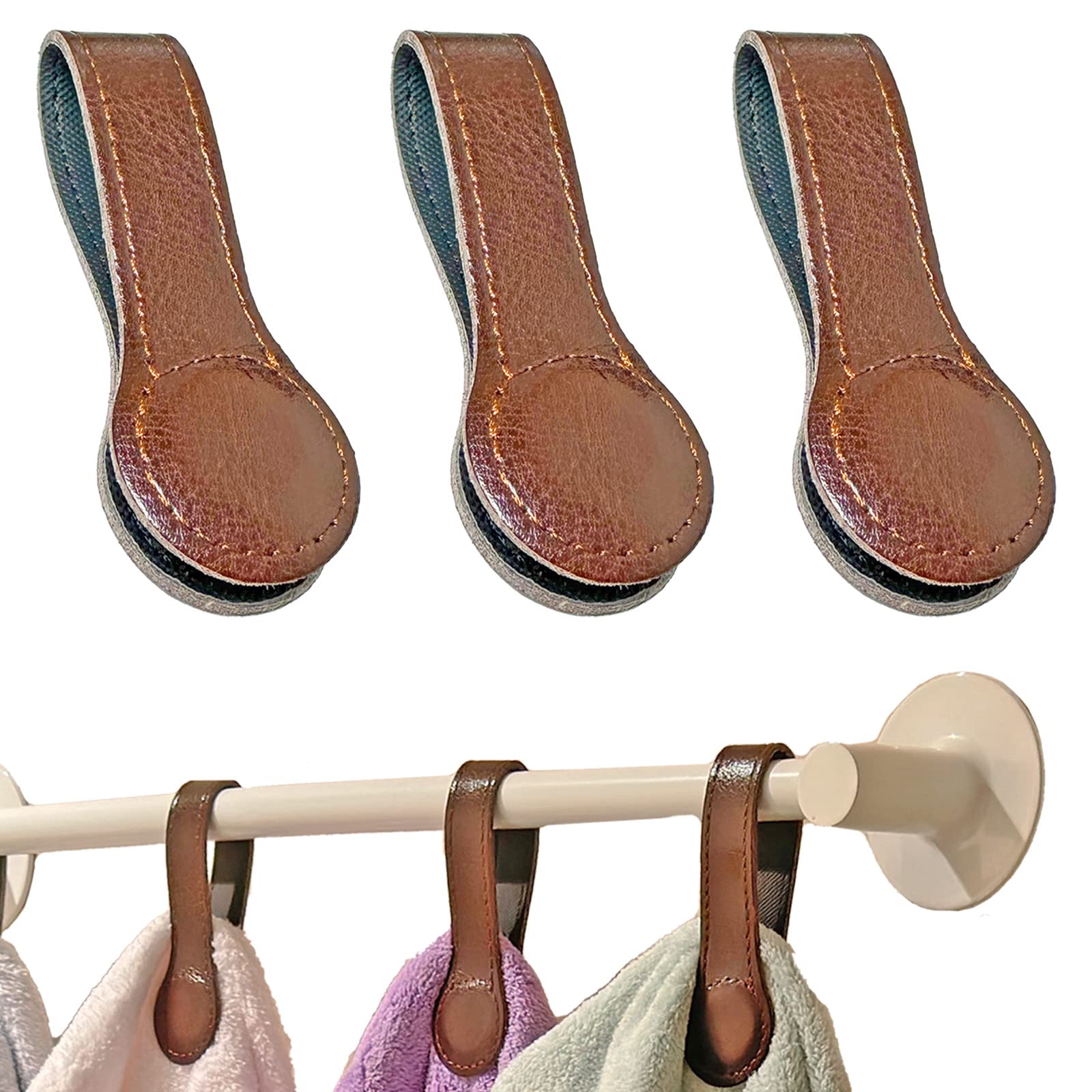 Prriudy brown leather towel clip with magnets securing towels neatly.
