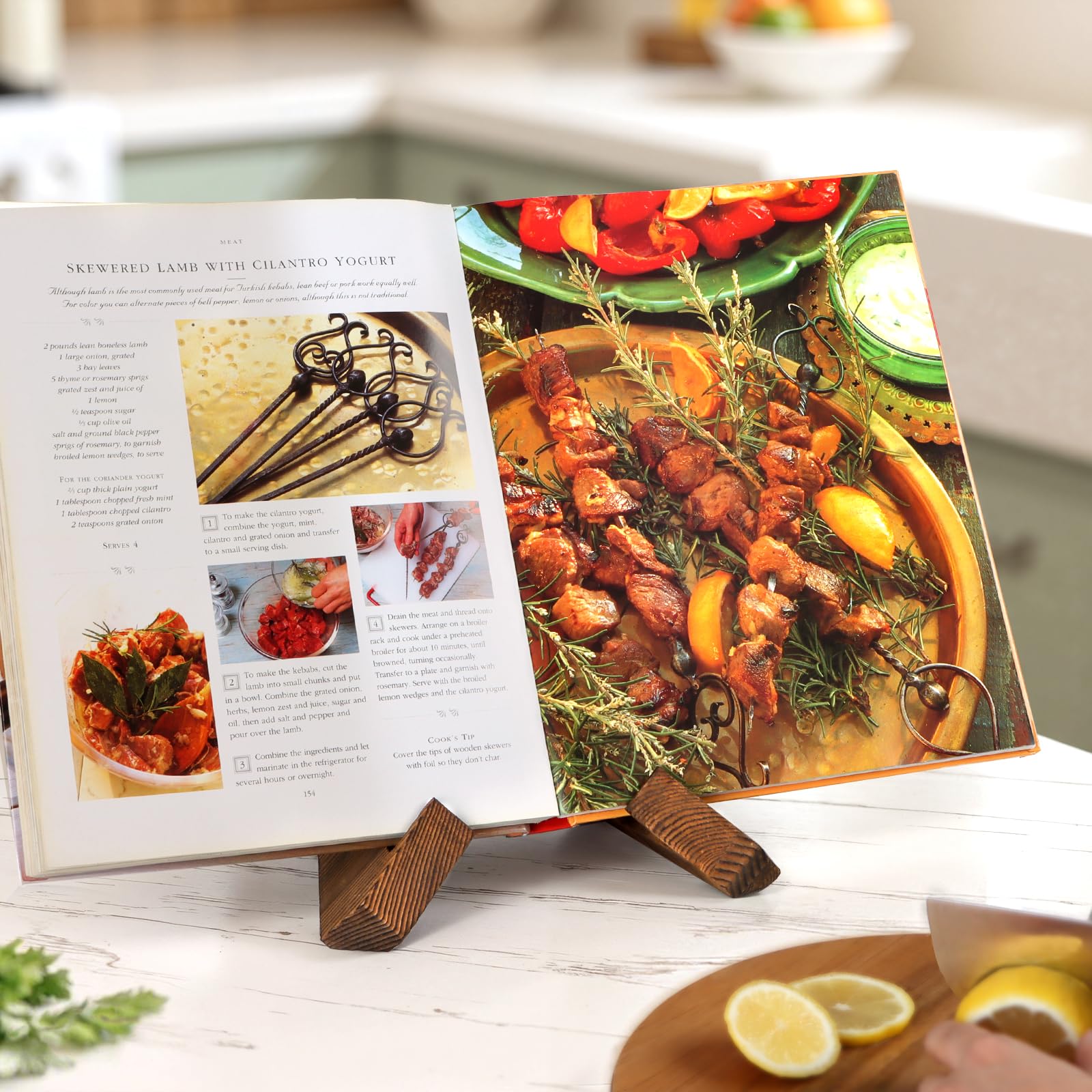PUERSI cookbook stand accommodates cookbooks up to 9x12.8 inches.