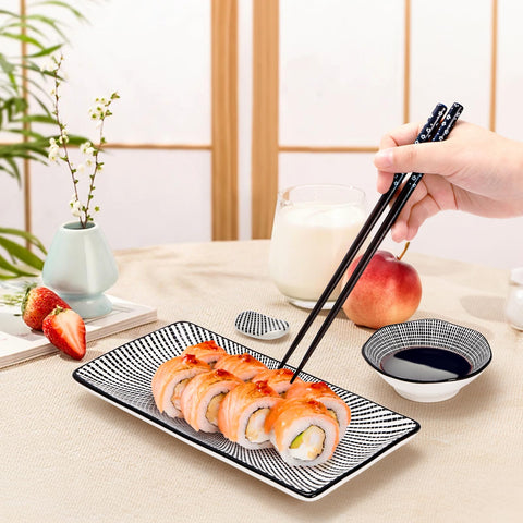 Pumtus black-line patterned dinnerware adds contemporary elegance to any setting.